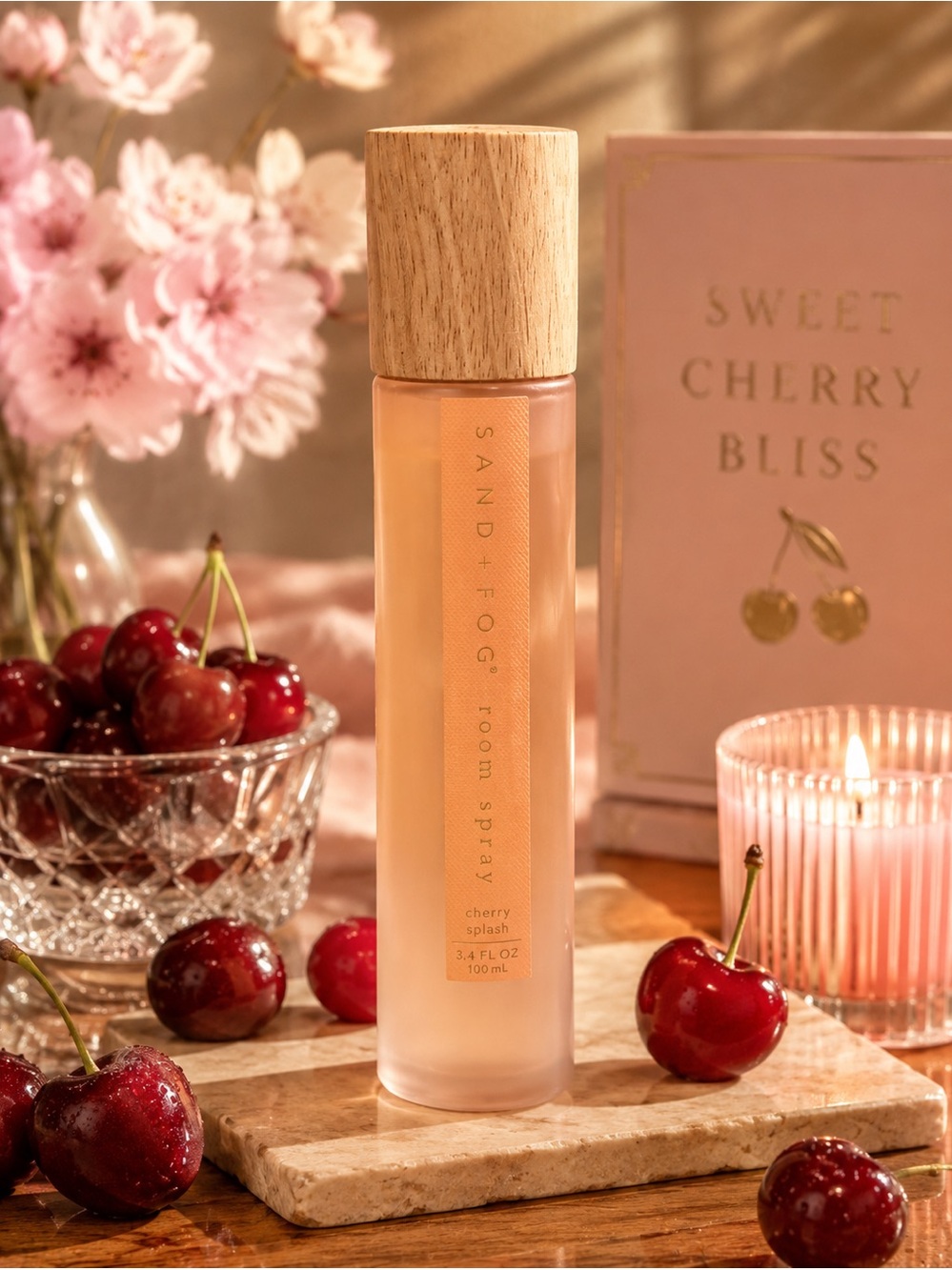 SAND + FOG Cherry Splash 100 ml Room Spray in Peachy Pink bottle